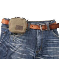 a man's jeans belt with a small pouch in the pocket on his waist