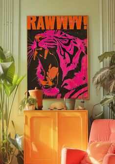 an orange and pink chair in front of a poster with the word raww on it