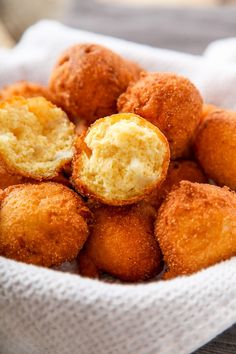 some fried food in a white bowl on a table