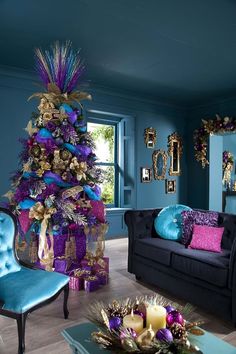 a living room filled with furniture and a christmas tree in the middle of the room