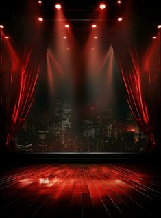 an empty stage with red curtains and spotlights on the cityscape at night