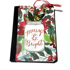 a christmas card with a mason jar filled with holly and bright red berries on it