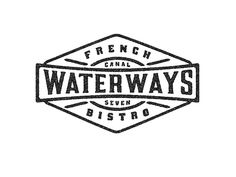 a black and white logo with the words waterways on it's front side