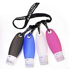 three different colored water bottles on a lanyard