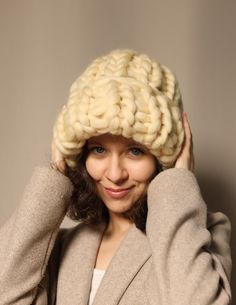 The coziest winter hat you have ever had! My granny knits all our chunky beanies from natural merino wool. We use soft yarn only, so you will be pleasantly surprised by your purchase! There is an Ivory color in the pictures. Any hat is available in more than 20 different colors! Please choose a color from our palette (the last photo). Get cheaper in a set with a scarf or knitted mittens! Treat yourself today with this hand-knitted hat from the super soft yarn. We will be happy to make a special winter accessory! If you want a custom detail, please contact us. We'll be glad to knit it according to personal measurements! ORDER DETAILS Usually, it takes 3-4 days to knit the hat or a set. WASHING Hand clean only. Use liquid detergent for wool. Water must be under 30ºC. Thank you for choosing u Hand Knitted Wool Beanie For Winter, Cozy Hand Knitted Winter Hats, Cozy Wool Crochet Hat For Winter, Hand Knitted Wool Hat, One Size, Handmade Wool Crochet Hat For Winter, Cozy Chunky Knit Hat, Cozy Chunky Knit Cap, Hand Knitted Merino Wool Hats For Cold Weather, Handmade Wool Beanie For Winter