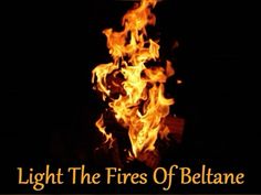 a fire with the words light the fires of beltane