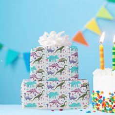 two birthday cakes with candles on them next to a cake covered in sprinkles