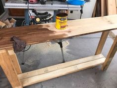 a workbench made out of wood and some tools