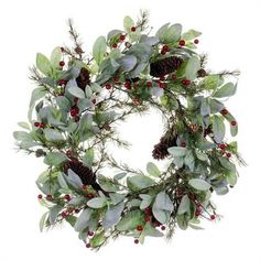 a christmas wreath with pine cones and berries