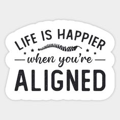 a sticker that says life is happier when you're aligned