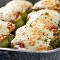 stuffed peppers with cheese and herbs in a pan