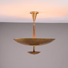 a light fixture hanging from the ceiling in a room