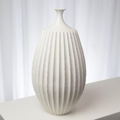 Crisp, symmetric ridges accentuate the rounded shape of the Sawtooth Vase. Textured, matte white Portuguese ceramic. Dimensions Overall 21"H x 11.5"Dia. (8.8 lbs)  Dust with dry cloth Product is not Watertight Small Plant Stand, H Design, Global Views, Ceramic Floor, Rustic White, Floor Vase, Kathy Kuo Home, Bottle Vase, Table Vases