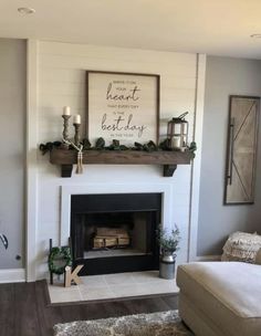 a living room filled with furniture and a fire place in the middle of the room