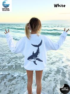 ✨🐋Welcome to EasyWearCollection🐋✨ Embrace the spirit of the ocean with this stylish sweatshirt featuring a detailed shark illustration on the back. Perfect for shark enthusiasts and anyone who loves marine life, this cozy crewneck is an ideal blend of comfort and unique style. ✨How to order             1.Select your product             2.Choose options(size,color)             3.Add to cart and proceed to check out or buy now             4.Wait for shipping process ✨Processing/Shipping time Shirts Detail, Shark Illustration, Shark Sweatshirt, Shark Design, Beach Sweatshirt, Beach Sweater, Shirt Detail, Sea Creature, Whale Shark