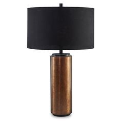 a table lamp with a black shade on the base and a gold cylinder in the middle