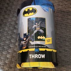 the batman character is on display in this canistere for kids to play with