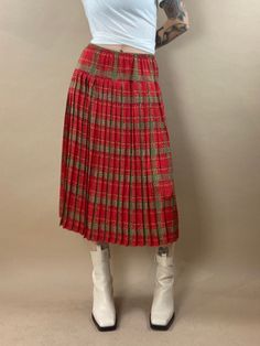 "1970s silky polyester pleated skirt. Its got elastic at the waist and is in great vintage condition. It also comes with a bonus matching scarf! Best fit a 27\" - 28\" waist Measurements: Waist: 27\" - 28\" Length: 29\" Model is 5'7, typically wears a size small and is a 26\"-27\" waist. Measurements are taken seam to seam while lying flat and are not doubled. Please refer to measurements to ensure proper fit. Due to the nature of Vintage goods there may be minor flaws or imperfections. These add to the beauty and uniqueness of each item. All sales are final. When you are ready to purchase please read our shop policies." Blue Suit Vest, Denim Maxi Skirt, Hand Knitted Sweaters, Classic Outfits, Lovely Dresses, Floral Sleeveless, Light Wash Denim, Sleeveless Maxi Dress, Dream Wardrobe