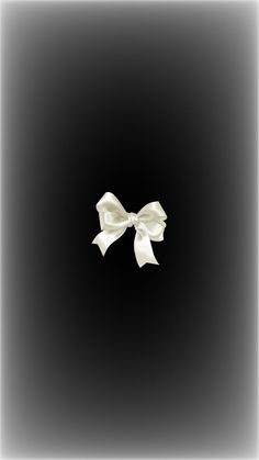 a white bow on a black background