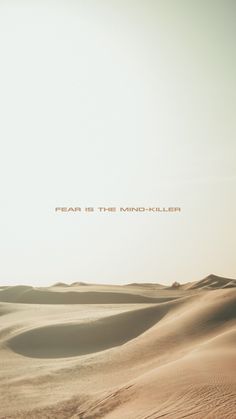 a desert with sand dunes and the words fear is the mind killer written on it