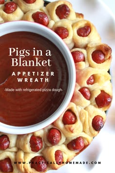 pigs in a blanket appetizer wreath made with refrigerated pizza dough