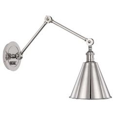 a chrome wall light with an adjustable arm and metal cone shade on the side, against a white background