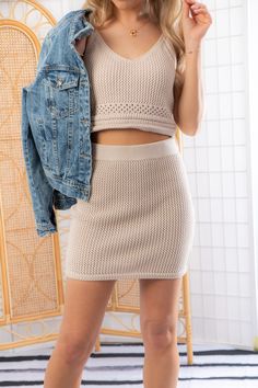 Get ready to fulfill your crochet dreams with the Z Supply Natural Carlita Crochet Mini Skirt ! This vintage-inspired skirt is the epitome of warm weather style. With its elasticized waistband, it offers a comfortable and flattering fit. Made from 100% cotton crochet knit, it combines both style and breathability. This mini skirt pairs perfectly with our Z Supply Natural Embrie Crochet Tank for the ultimate beach vacation look. Embrace the beauty of crochet and step out in style with this must-h Spring Knit Mini Skirt, Knit Mini Skirt For Spring, Spring Fitted Knit Mini Skirt, Fitted Knit Mini Skirt For Spring, Summer Crochet Skirt In Beige, Beige Crochet Skirt For Summer, Summer Beige Crochet Skirt, Knit Mini Skirt For Summer, Summer Fitted Knit Skirt