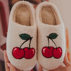 These cherry stem slippers are the perfect way to bring some sweetness into your life! They're fuzzy, squishy, and oh-so-comfortable, and they have a rubber sole so you can wear them anywhere. Plus, they make a perfect gift for any special lady in your life. With over 20 styles to choose from, you're sure to find the perfect pair of slippers for anyone and everyone on your list! hand wash warm; hang to dry s/m fits sizes 6-7, m/l fits sizes 8-9, l/xl fits size 10 Wholesale Hats, Popular Hats, Christian Christmas Gift, Bedroom Slippers, Mom Hats, Pink Cowgirl, Fuzzy Slippers, Trendy Mom, Stylish Mom