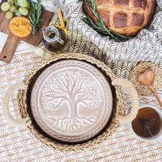 a table topped with bread and other food items