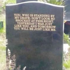 a grave marker with the words you, who is standing by my grave don't look so shocked at this sight