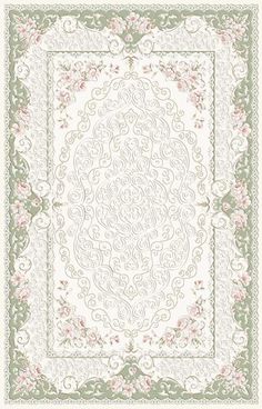 a white and green rug with pink flowers on the border, in an ornate pattern