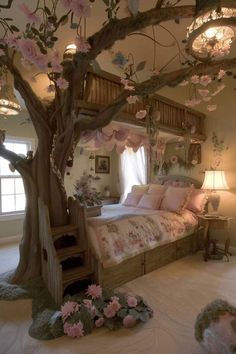 a bedroom decorated in pink and white with flowers on the bed, chandelier