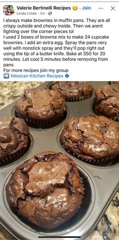 some chocolate muffins in a cupcake pan on top of a granite counter