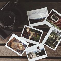 several polaroid photos are placed next to an old camera