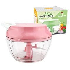 a pink food processor sitting next to a box