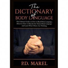 the dictionary of body language by p d marel, with an image of his hands folded