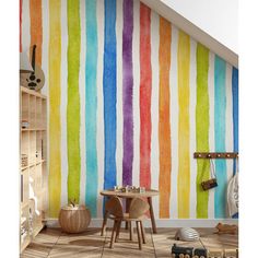 a child's room with colorful stripes painted on the wall