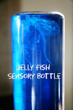 a blue bottle with the words jelly fish on it