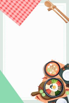 an overhead view of a table with food and utensils on it, next to a blank paper