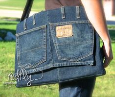 a person carrying a bag made from old jeans