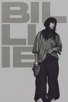 a black and white photo of a woman standing in front of a wall with the words bill lie on it