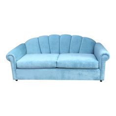 a blue couch sitting on top of a white floor