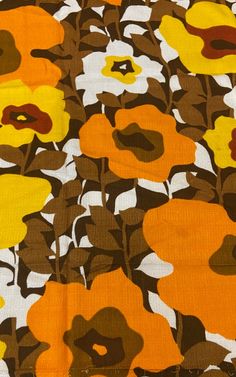 an orange and brown floral print fabric