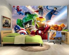 a bedroom with a wall mural depicting the avengers and iron man characters in front of it