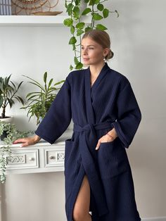 "Waffle Hand Made Kimono style Bathrobe Wrap yourself into the softest waffle robe, ever. Comfortable, high-quality, cosy, and sustainable. Perfect as a gift for any occasion. Made from 100% pure organic Netherlandish cotton. Oeko-Tex Standard 100 Certified ® Enjoy the spa feeling at home! * Soft and comfortable * Absorbent and quick drying * Lightweight and breathable * Durable * Hypoallergenic * 100% cotton waffle  * Easy garment care SIZING Bathrobes are designed for a loose fit: S/M:  - total length (center back length) - 115 cm/45\"; - bust - 60 cm/23.6\"; L/XL:  - total length (center back length) - 115 cm/45\"; - bust - 66 cm/26\"; Models wearing size S/M Girl height 5'61 /168cm C O L O R S: We have a wide selection of colors: https://www.etsy.com/shop/KajStore?ref=seller-platform-m Bathrobes For Women, Bath Robe Aesthetic, Bathrobe Aesthetic, Blue Summer Robe For Daywear, Blue Robe With Kimono Sleeves For Home, Long Blue Robe For Home, Blue Waffle Robe, Long Sleeve Blue Cotton Robe, Lounge Robes