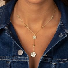 Discover the perfect blend of sophistication and charm with the Adina Eden Multi CZ Pave Outlined Colored Flower Stone Lariat Necklace. Crafted from 14K gold-plated brass, this exquisite necklace showcases a stunning Mother of Pearl gemstone, highlighted by clear CZ stones in a delicate flower design. The lariat drop measures 2.6", adding a graceful touch to the 16" chain, which also includes a 2" extender for versatile styling. This necklace is ideal for adding a touch of elegance to any outfit Flower Stone, Pearl Gemstone, Lariat Necklace, Delicate Flower, Cz Stone, Flower Design, Flower Designs, Eden, Mother Of Pearl