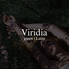 two women laying in the grass with their arms around each other and text that reads, viridda green latin