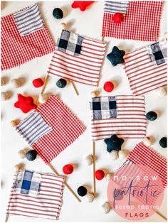 red, white and blue gingham checkered flags with pom poms on them