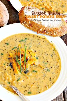 a bowl of soup with bread on the side