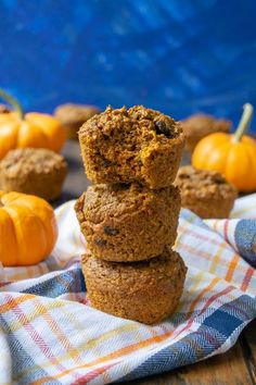 pumpkin bran muffins stacked on top of each other with the words, pumpkin bran muffins